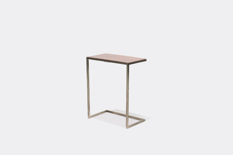 side of side table with antique copper table top on antique nickel metal frame