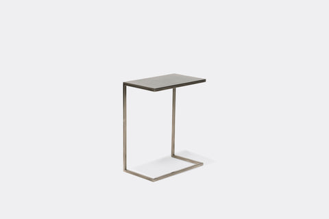 side of side table with antique nickel table top on antique nickel metal frame