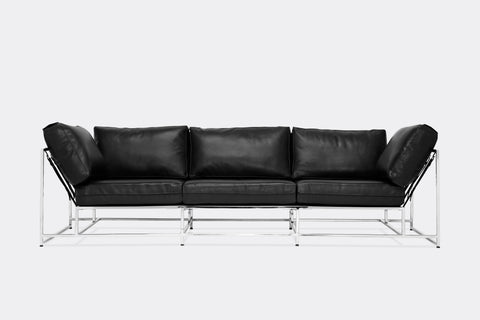 Front of Sofa with black leather upholstery and polished nickel metal frame