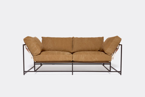front of two seat sofa brown canvas upholstery on black metal frame