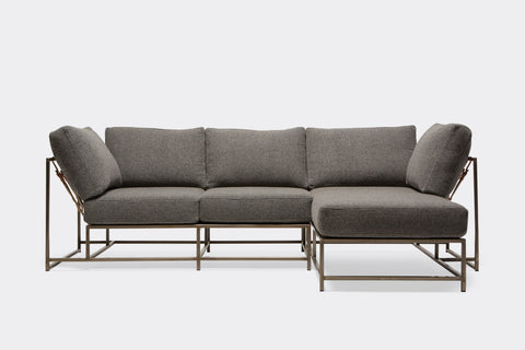 front of sectional with grey wool upholstery on antique nickel metal frame