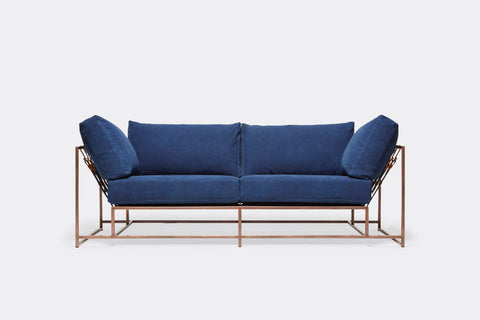 front of two seat sofa blue canvas upholstery and antique copper metal frame