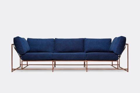 front of sofa with blue canvas upholstery on copper metal frame