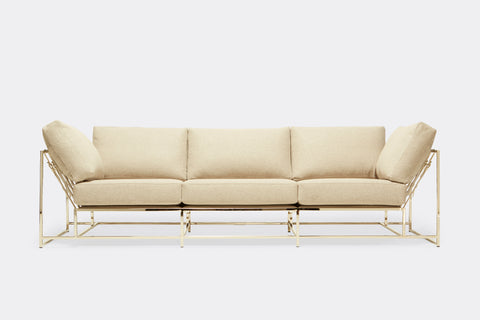 Front of Sofa with cream wool upholstery and polished nickel metal frame