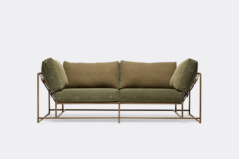 front of two seat sofa olive canvas upholstery and antique brass metal frame