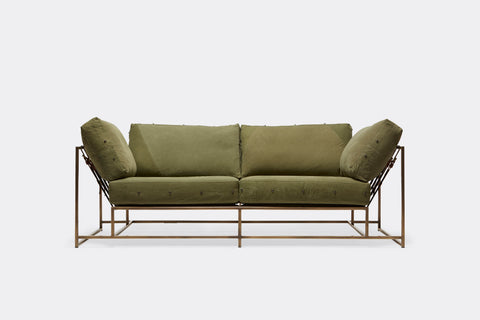 front of two seat sofa olive canvas upholstery and antique brass metal frame