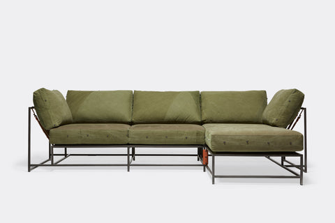 front of sectional with green canvas upholstery on black metal frame