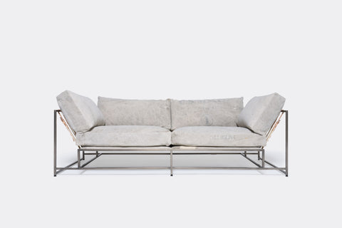 front of two seat sofa with grey canvas upholstery on antique nickel metal frame