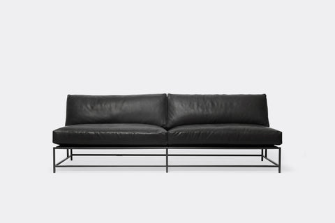 front of loveseat with black leather upholstery on black metal frame
